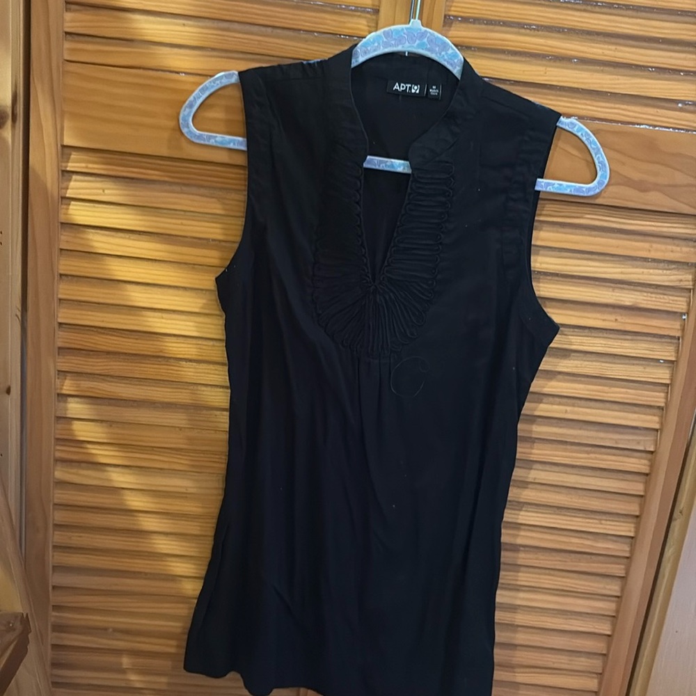 Elegant, black, cotton sleeveless shirt